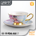 Porcelana moderno oro rim té platillo taza